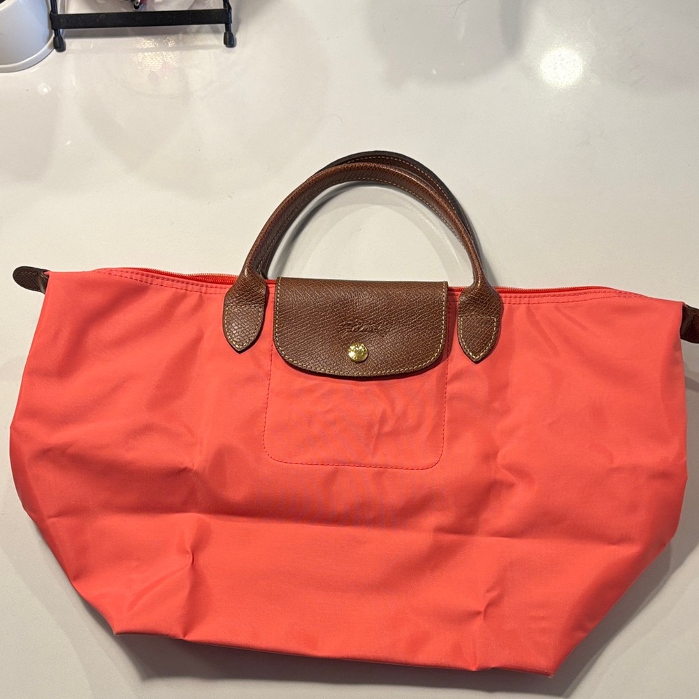 Longchamp LePliage Medium Short handle in gorgeous coral pink/orange